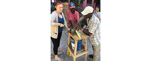 Haiti - Maureen trying Biomass Grinder